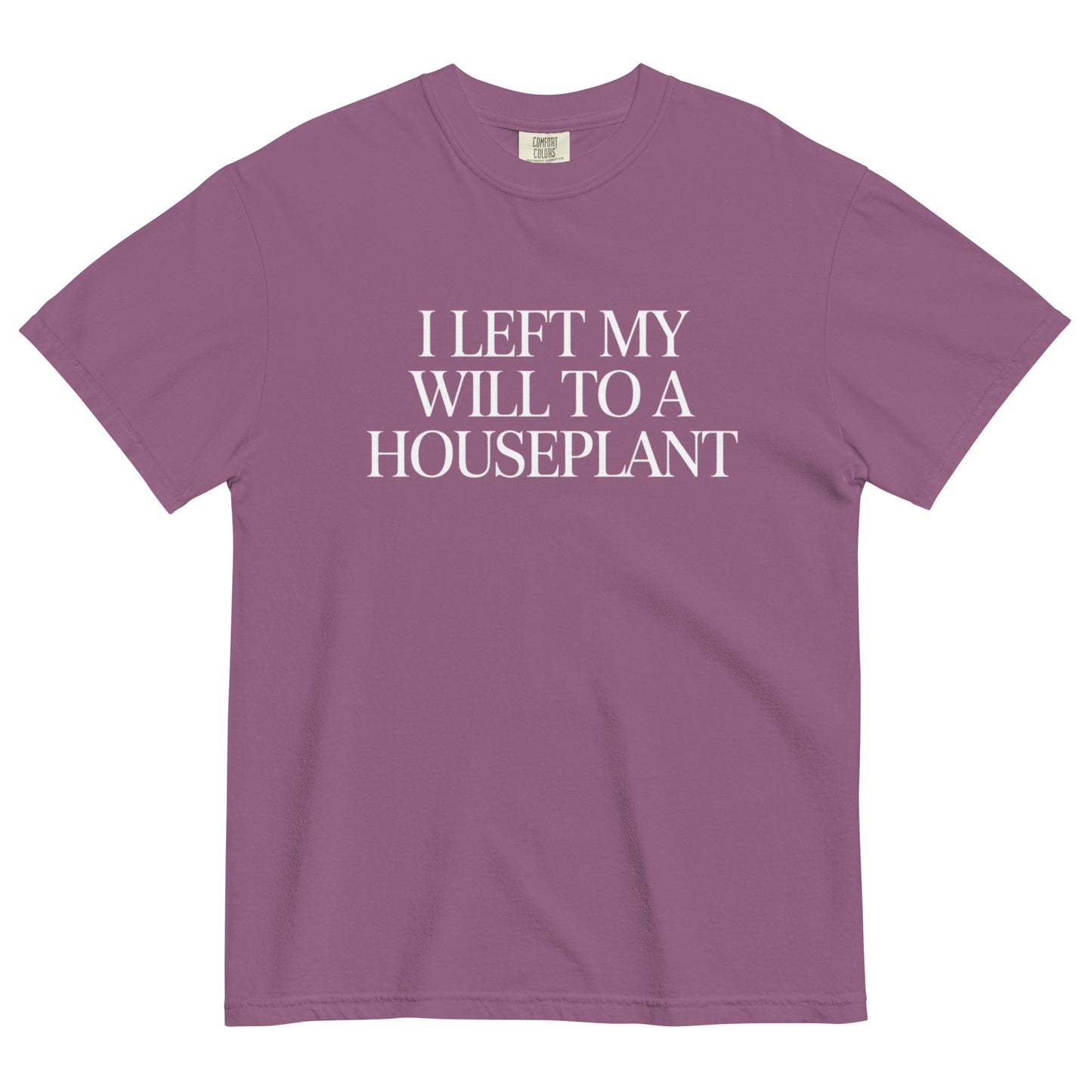 Berry “I Left My Will to a Houseplant” t-shirt with bold white text, a sarcastic plant parent tee in a soft gothic pastel tone.