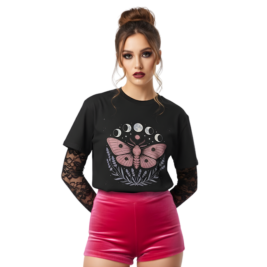 Model wearing black “Lunar Moth” t-shirt with pink moth and moon phase artwork, styled with red shorts and lace sleeves for an edgy celestial look.