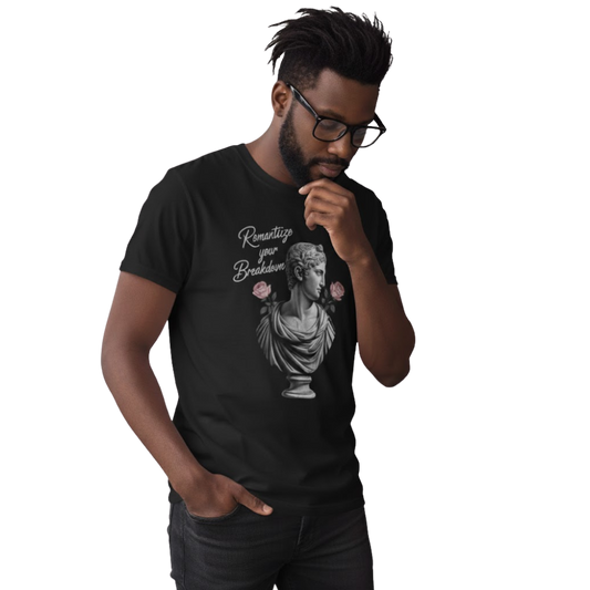 Model wearing black “Romanticize Your Breakdown” t-shirt with marble statue and pink rose design, styled for an artistic, moody aesthetic.