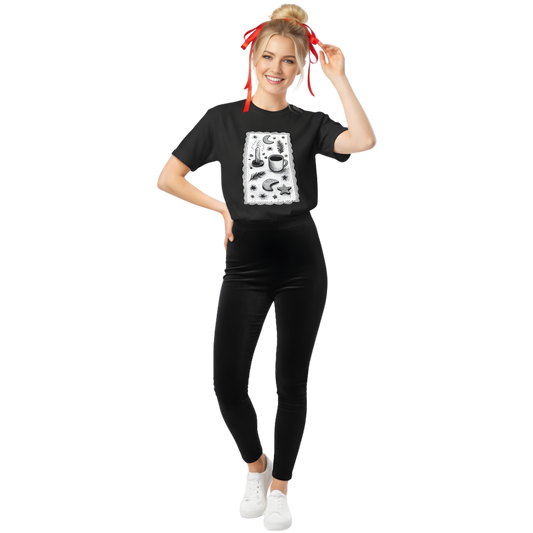 Woman wearing black witchy coffee and stars graphic tee styled with leggings, showing relaxed unisex fit.
