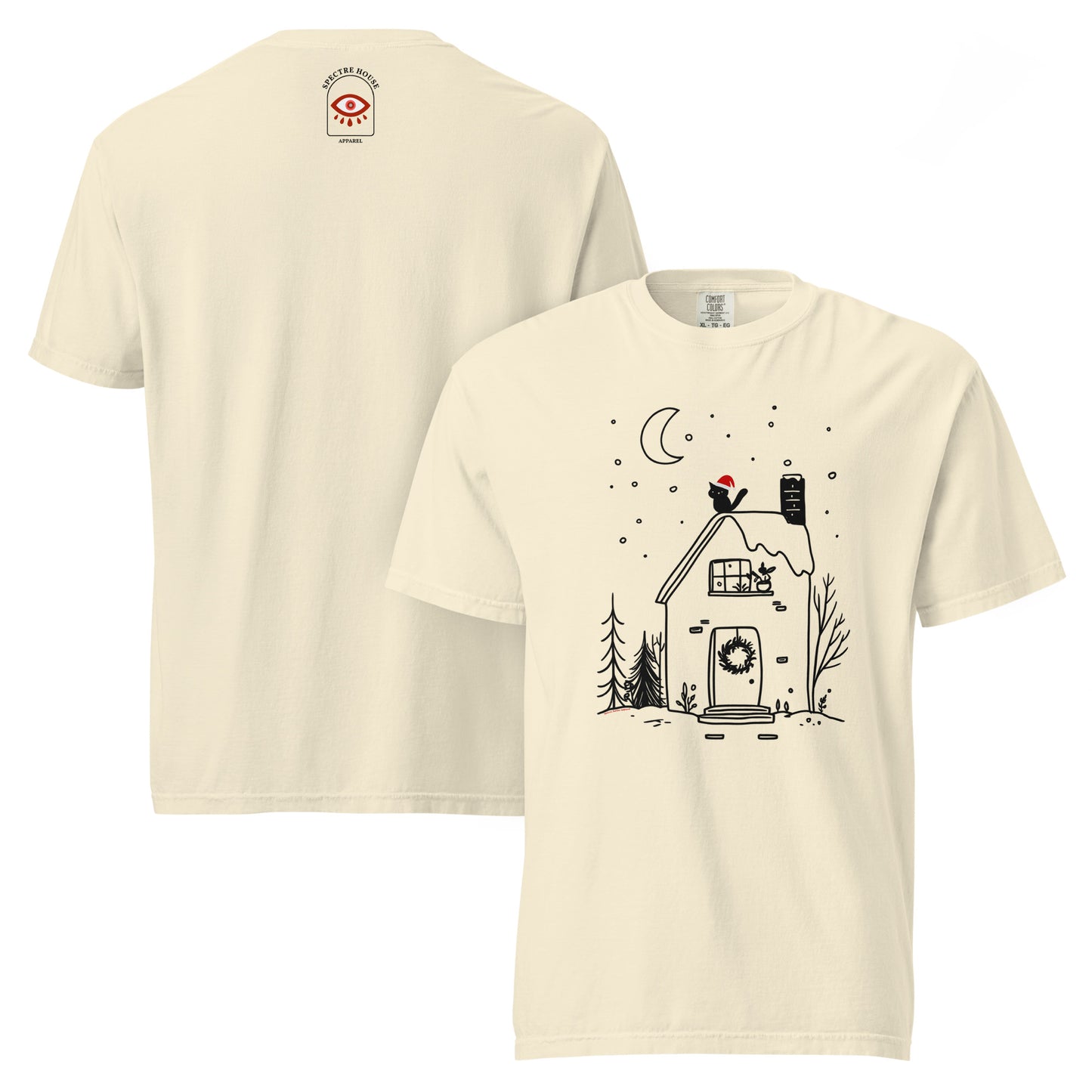 Front and back lay-flat display of ivory witchy cottage holiday T-shirt highlighting hand-drawn winter cabin print on soft Comfort Colors cotton.