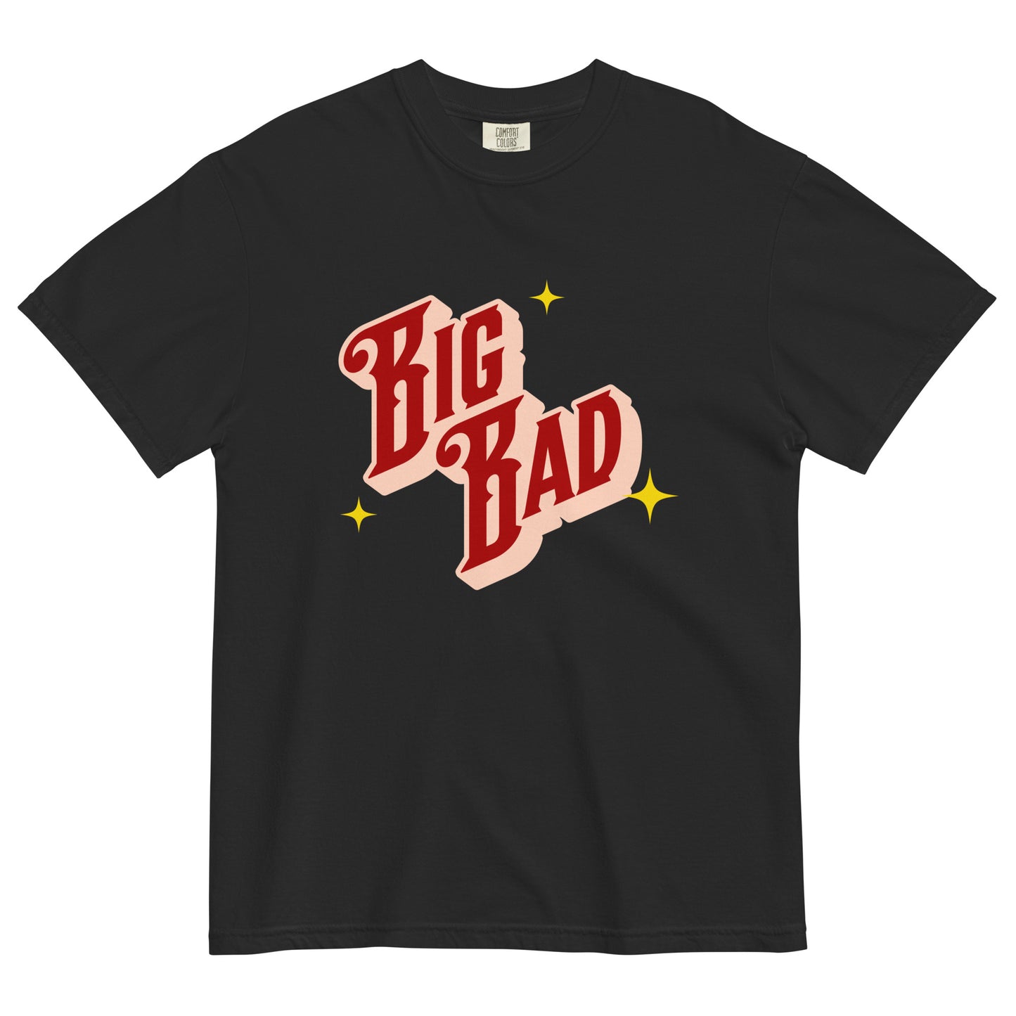 Black t-shirt laid flat with retro red and cream lettering that says ‘Big Bad,’ surrounded by yellow star accents.