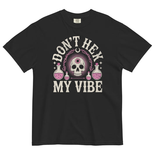 Don’t Hex My Vibe T-shirt flat lay showing witchy skull and potion design on black Comfort Colors tee