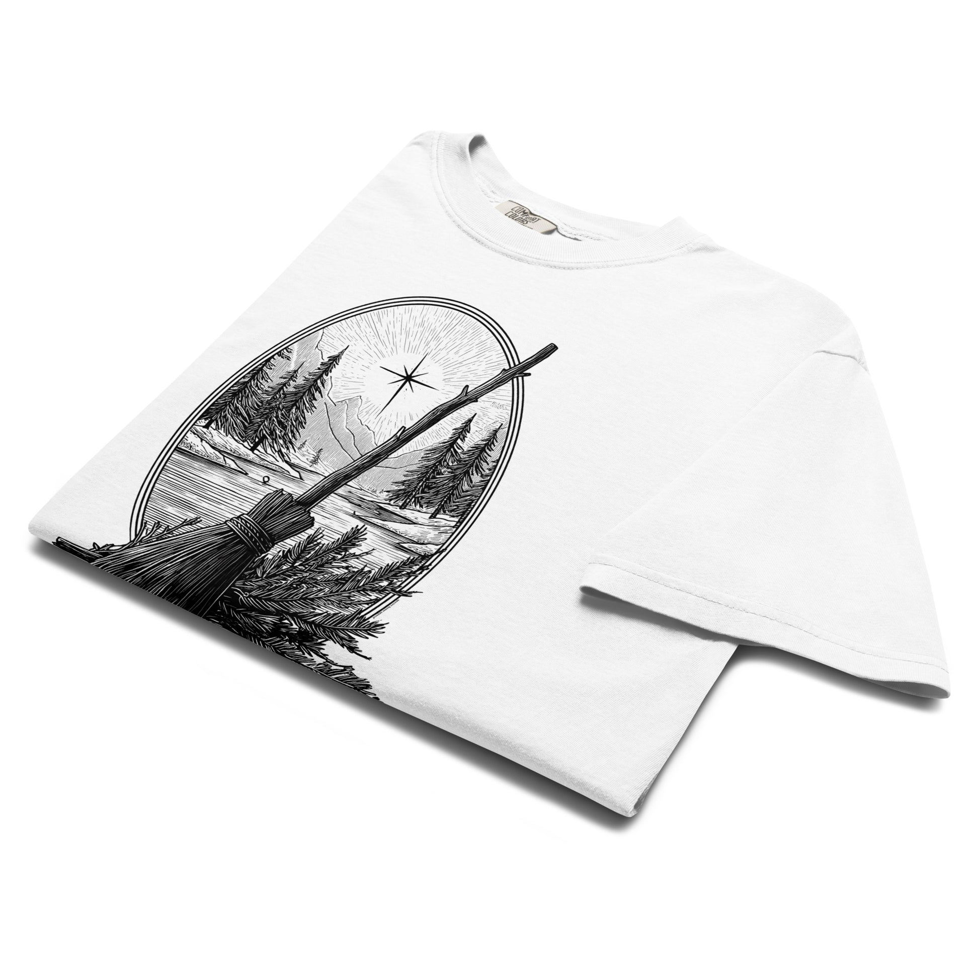 Folded lay-flat view of white “Happy Solstice” T-shirt showing detailed broomstick and solstice sun illustration.