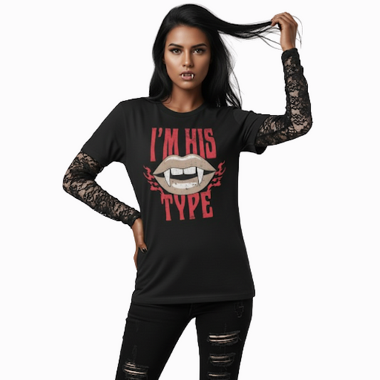 Model wearing black “I’m His Type” t-shirt with vampire mouth and red lettering, styled for an edgy alt-girl look with lace sleeves and attitude.