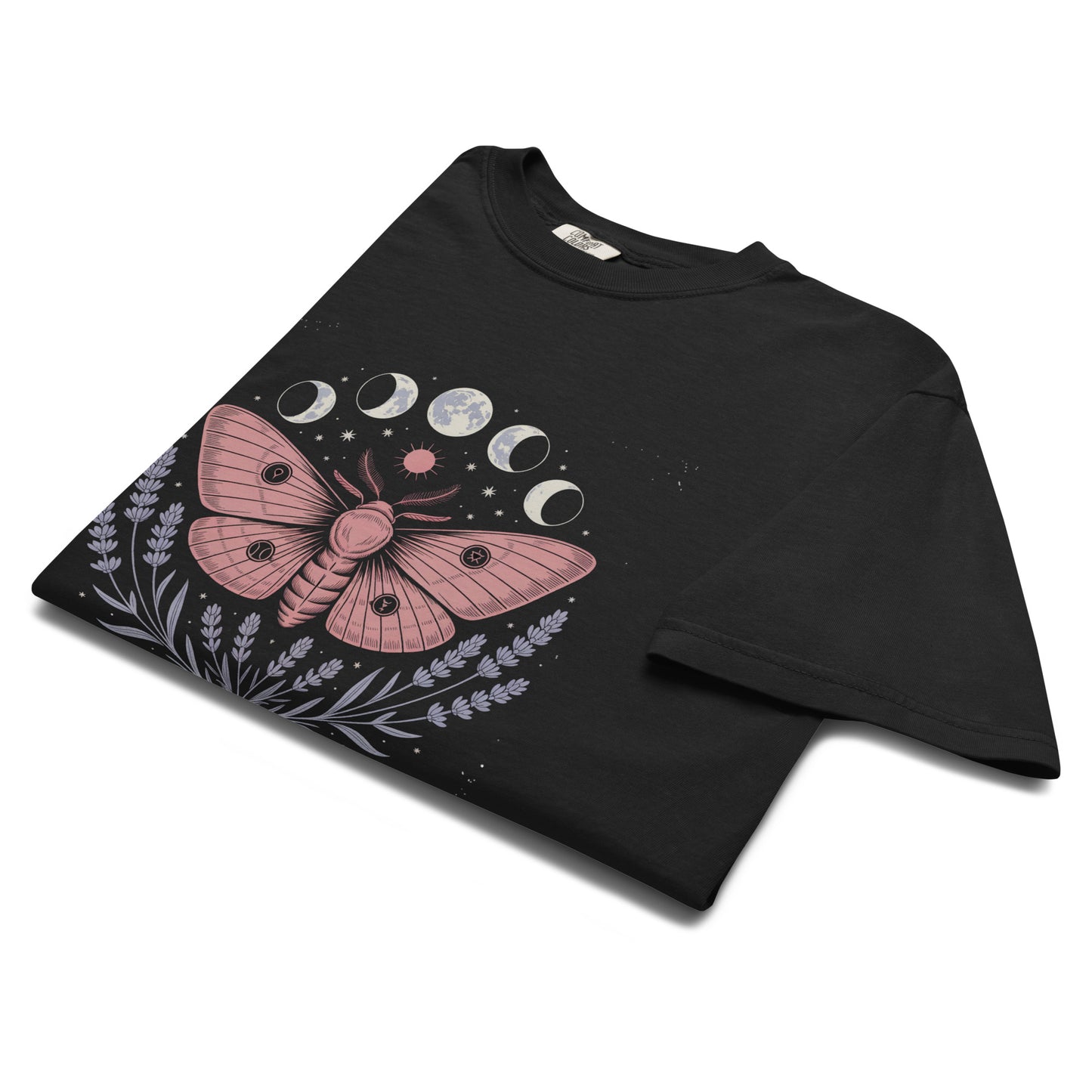 Folded black “Lunar Moth” t-shirt flat lay showing lunar cycle and botanical design, perfect for witchy fashion, moon lovers, and dark nature aesthetics.