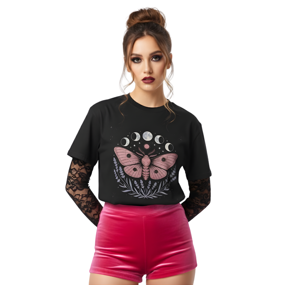 Model wearing black “Lunar Moth” t-shirt with pink moth and moon phase artwork, styled with red shorts and lace sleeves for an edgy celestial look.