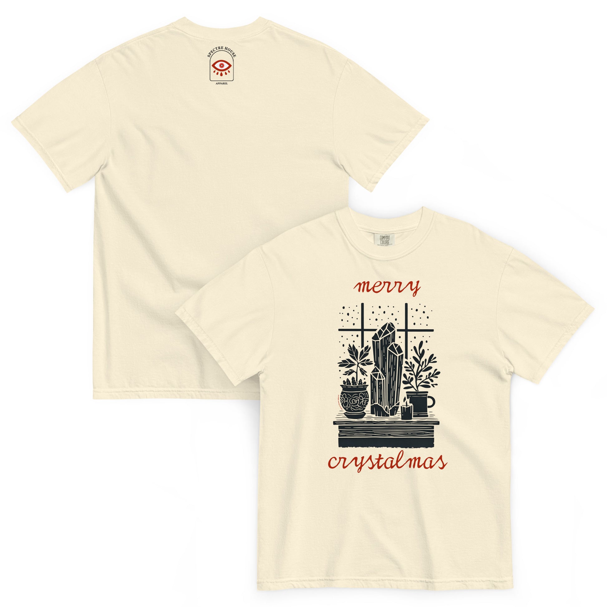 Front and back lay-flat display of ivory “Merry Crystalmas” T-shirt highlighting witchy crystal and candle design printed on soft Comfort Colors cotton.