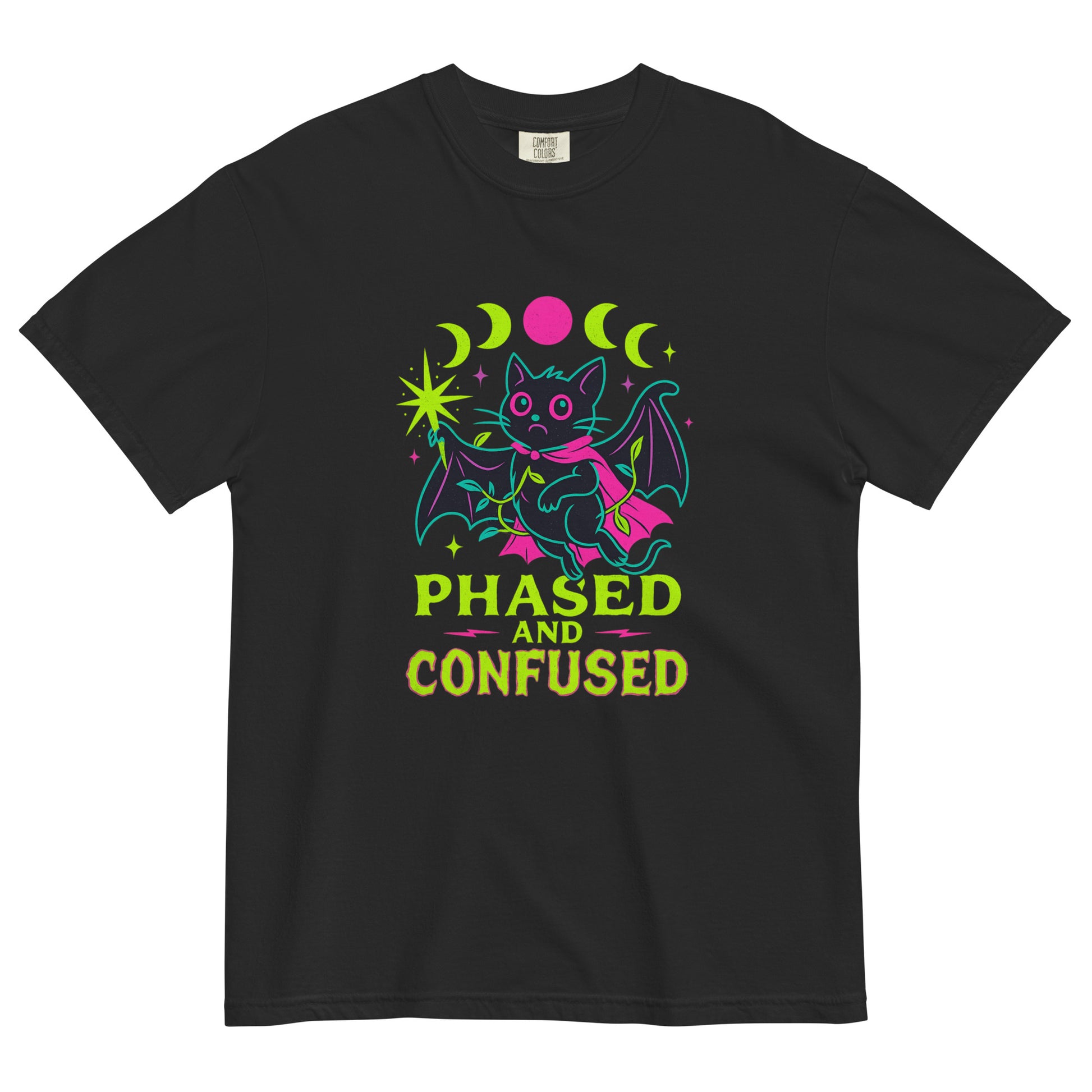 Phased and Confused bat graphic t-shirt laid flat on a black background, featuring a neon pink and green moon phase design with a cute gothic bat illustration.