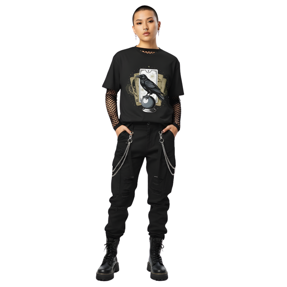 Model wearing black raven and tarot card t-shirt with crystal ball artwork, styled for a dark academia or witchy gothic aesthetic.