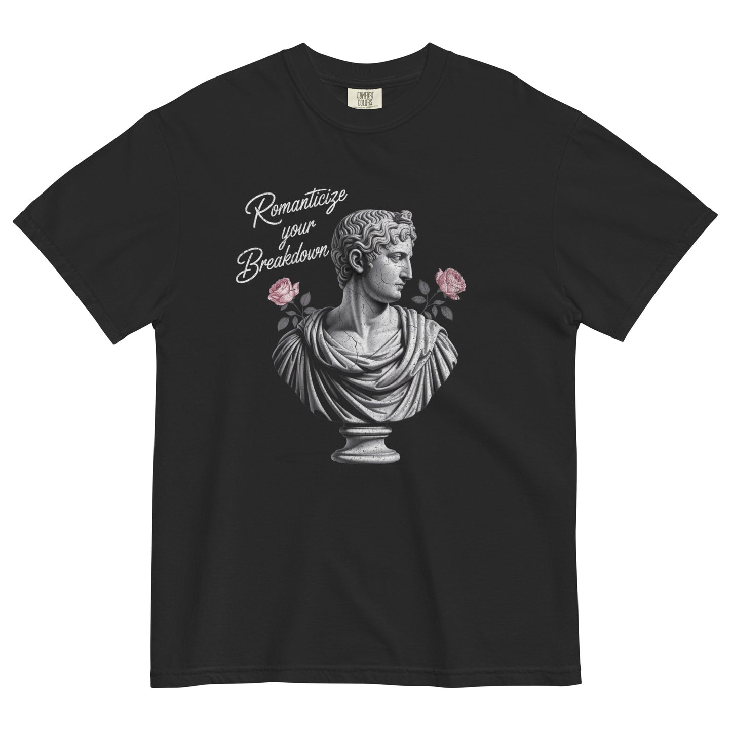 Black t-shirt lay flat featuring a neoclassical marble bust holding pink roses with text reading “Romanticize Your Breakdown,” a darkly elegant vintage-inspired tee.