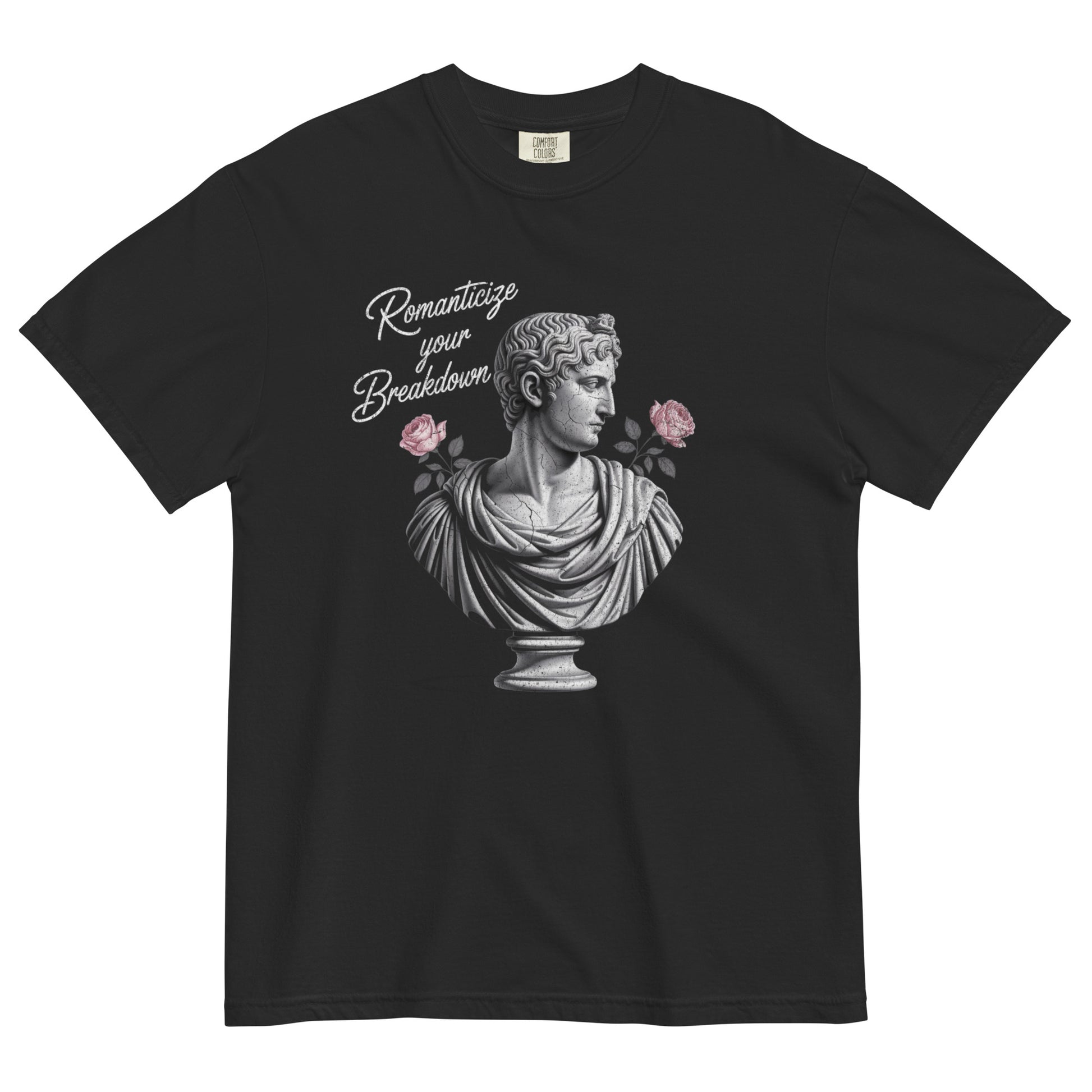 Black t-shirt lay flat featuring a neoclassical marble bust holding pink roses with text reading “Romanticize Your Breakdown,” a darkly elegant vintage-inspired tee.