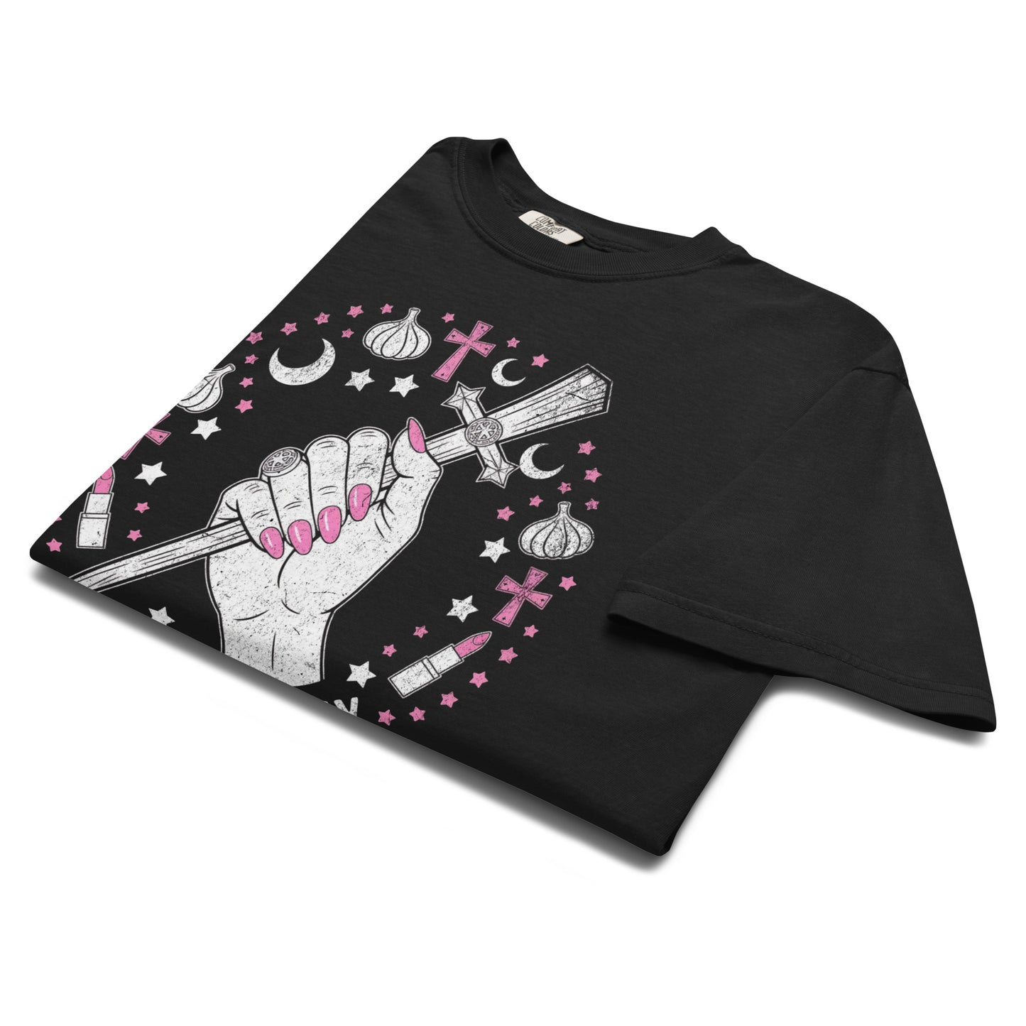 Folded black “Slay All Day” t-shirt flat lay showing hand-with-stake design and celestial accents, perfect for Buffy fans and lovers of playful gothic fashion.