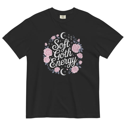 Black t-shirt lay flat featuring “Soft Goth Energy” text surrounded by pink roses, moons, and stars — a romantic gothic graphic tee with celestial floral design.