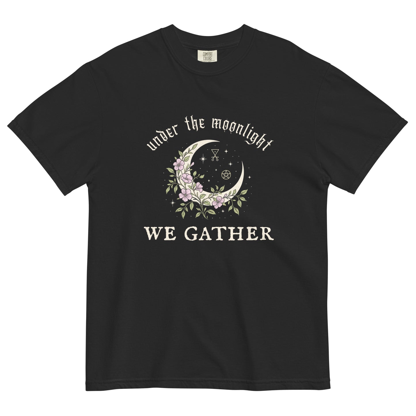 Black t-shirt with a crescent moon and floral design reading “Under the Moonlight We Gather,” a mystical witchy graphic tee for moon lovers and spiritual gatherings.