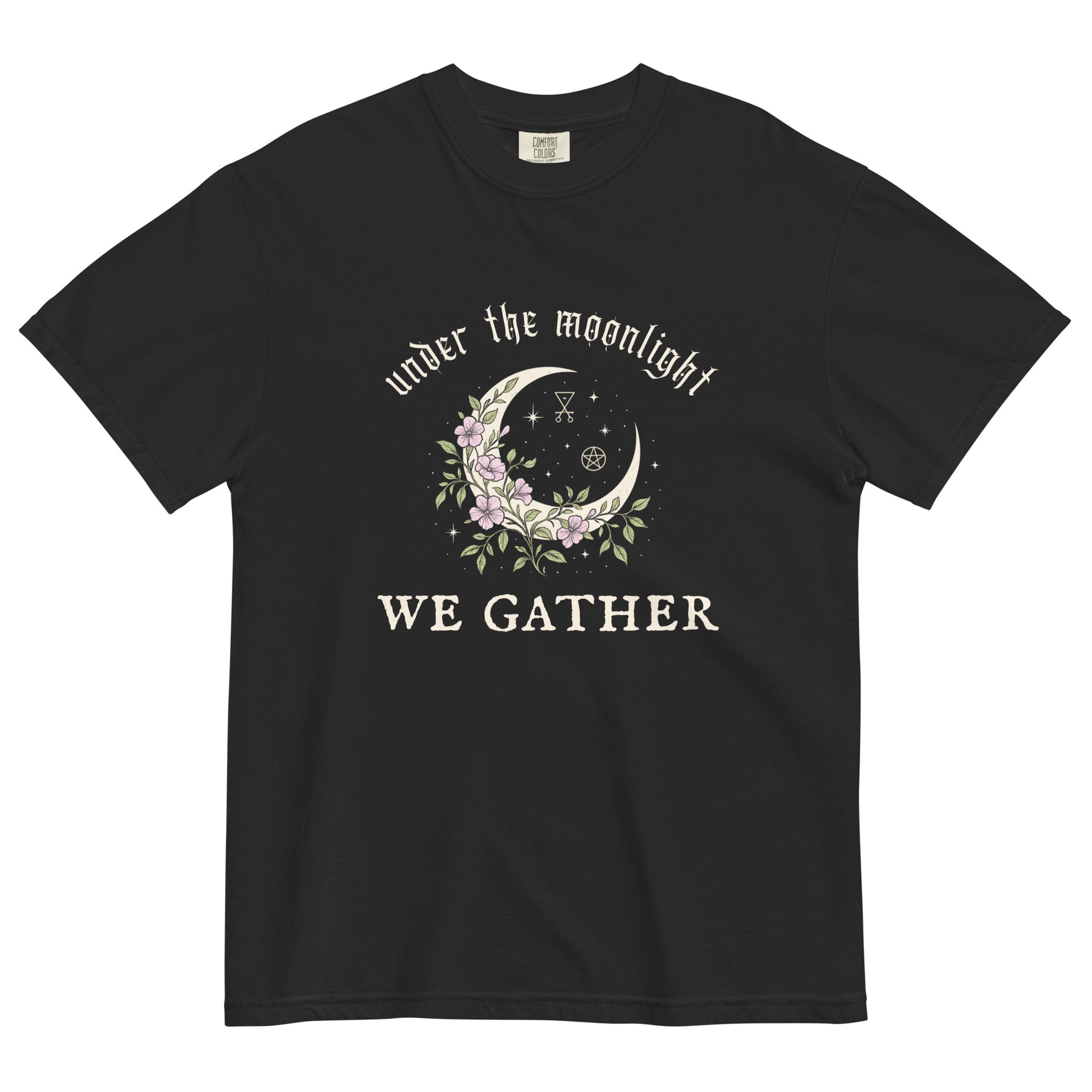 Black t-shirt with a crescent moon and floral design reading “Under the Moonlight We Gather,” a mystical witchy graphic tee for moon lovers and spiritual gatherings.