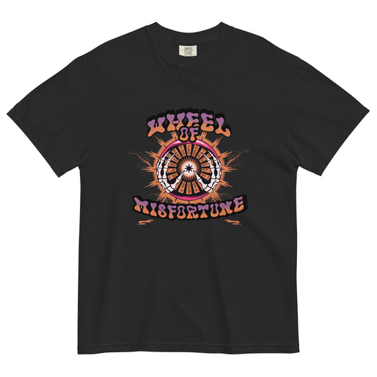 Black t-shirt lay flat featuring “Wheel of Misfortune” text with an illustrated tarot-style wheel surrounded by fire and celestial details, a darkly funny occult tee.