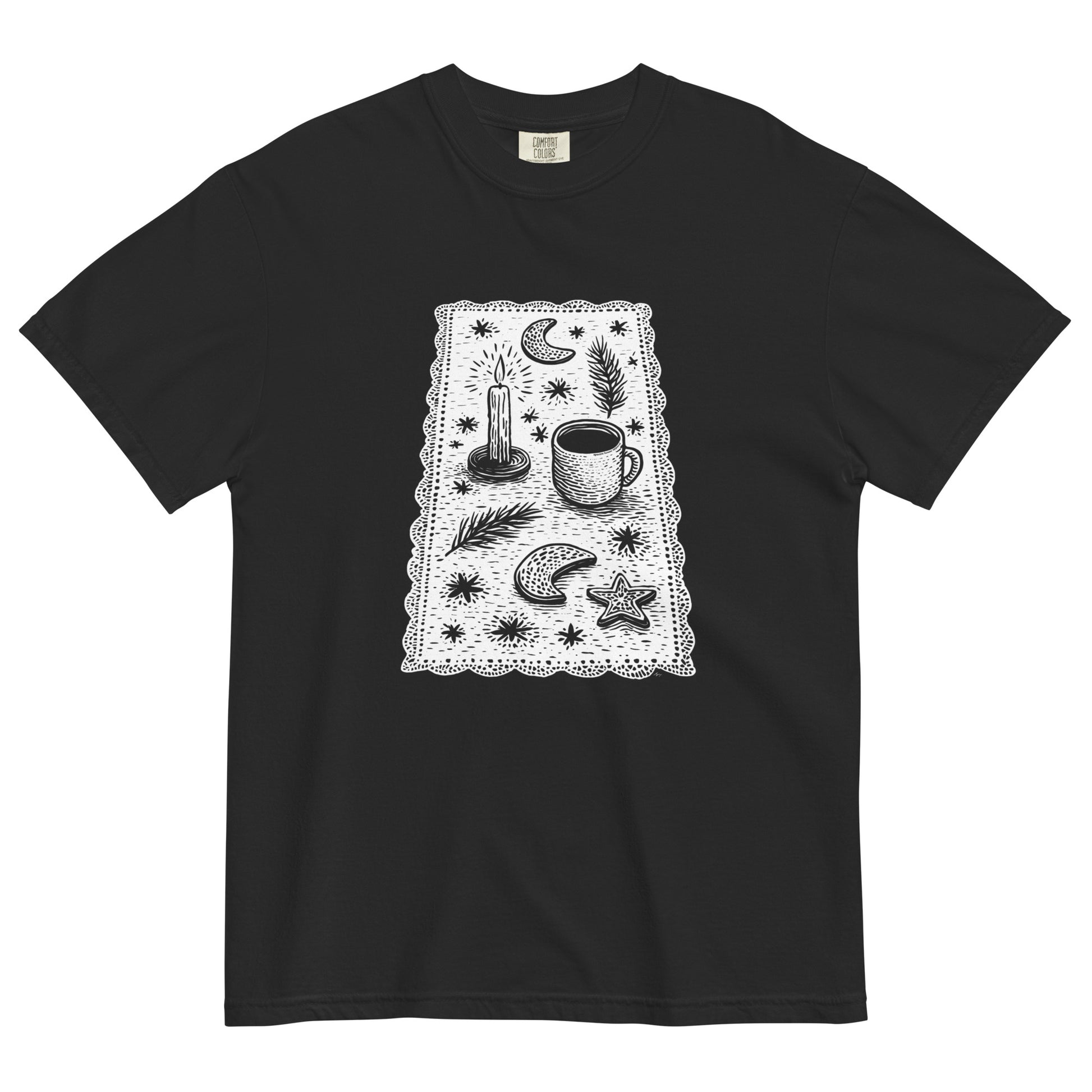 Black Comfort Colors T-shirt with mystical coffee, moon, and stars illustration, shown lay flat on white background.