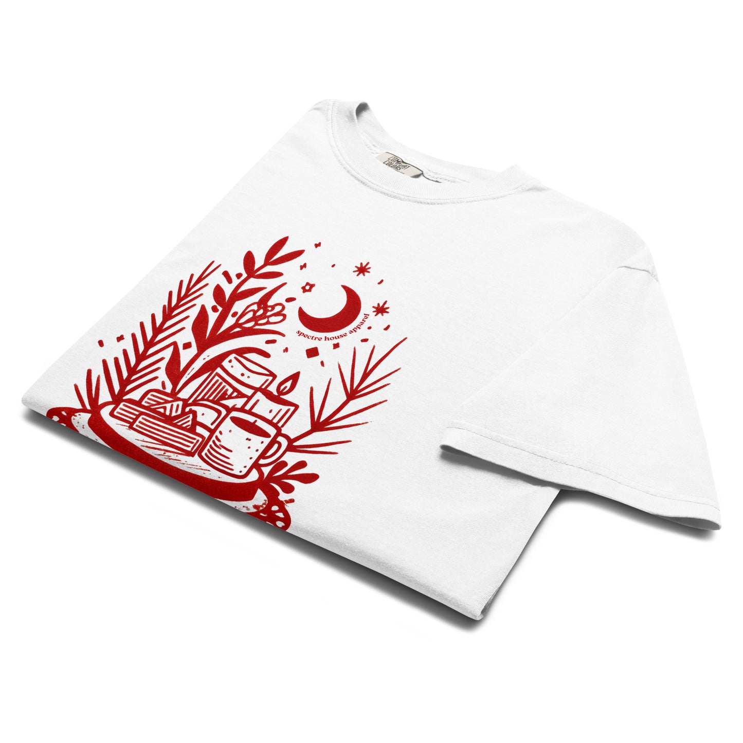 Folded lay-flat view of white witchy tea time T-shirt showing red celestial teacup and herb illustration.